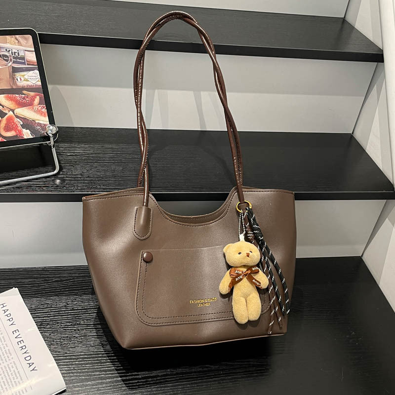Elegant Tote Handbag with Plush Keychain