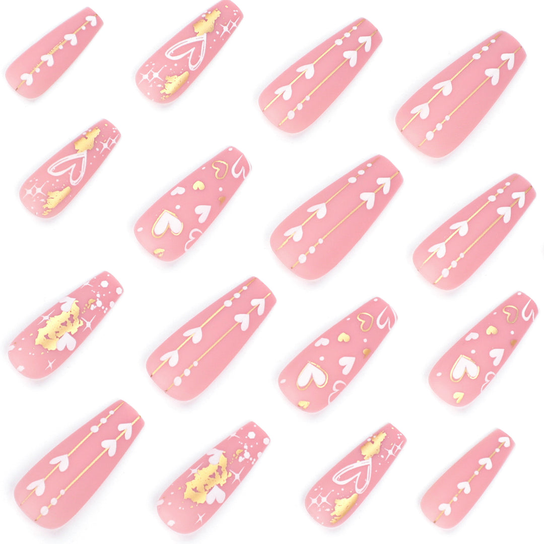 Artificial nail art with heart and glitter designs Stornfield