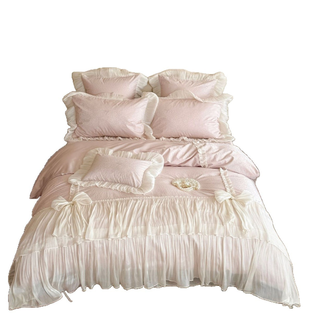 Elegant pleated bed set with gathered bed skirt and decorative pillows