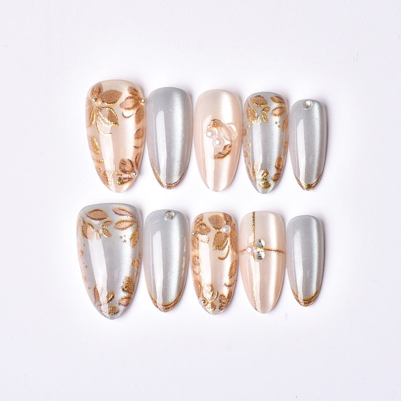 Decorative Press-On Nail Art Set with Floral and Metallic Accents Stornfield
