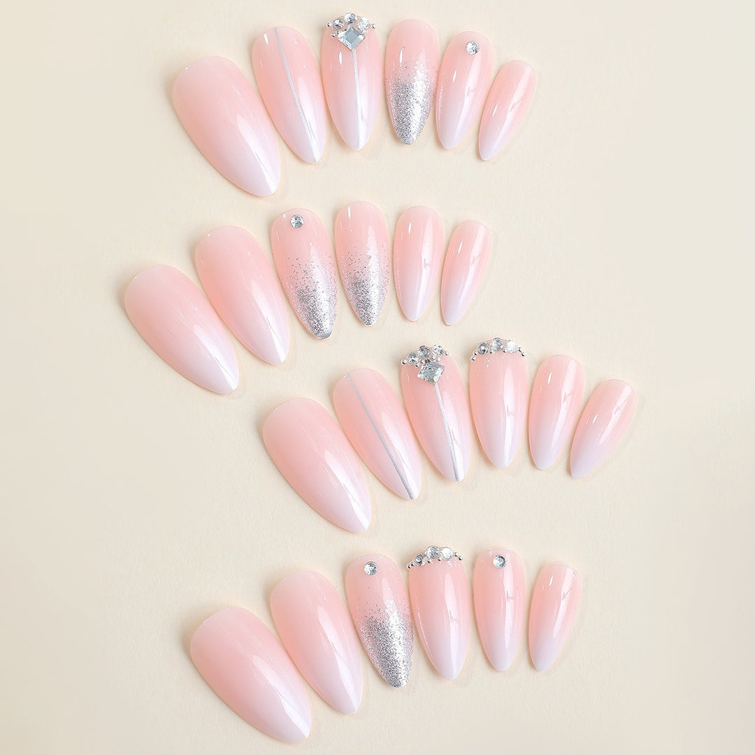Artificial nail set with elegant glitter and rhinestone accents Stornfield