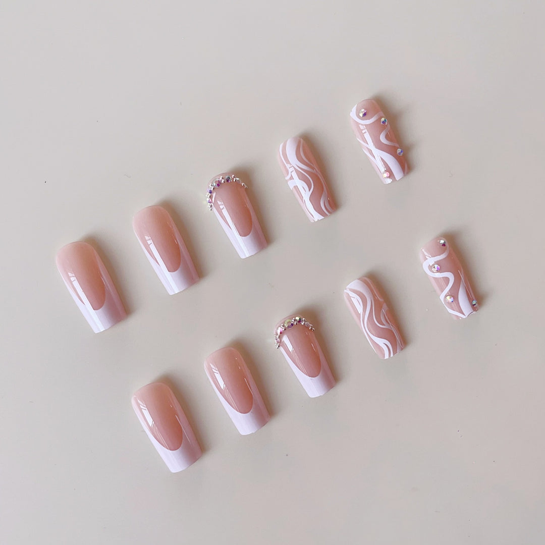 Artificial nail set with elegant French design and creative accents Stornfield