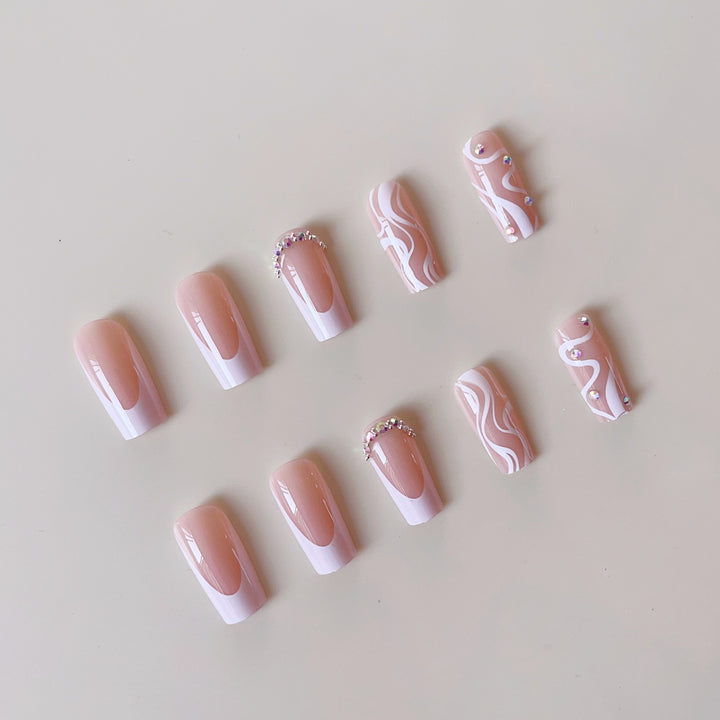 Artificial nail set with elegant French design and creative accents Stornfield