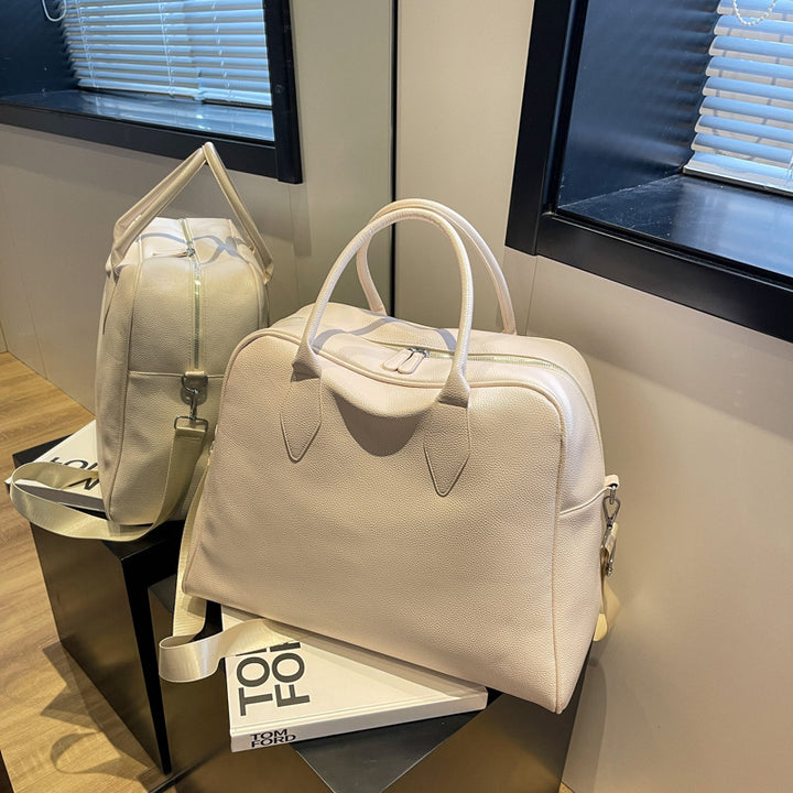 Stylish and Spacious Travel Bag with Versatile Carrying Options Stornfield