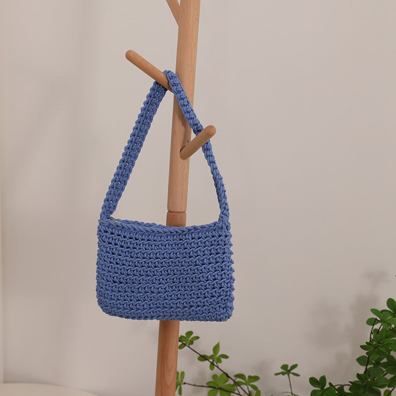 Handmade straw crossbody bag with structured design Stornfield