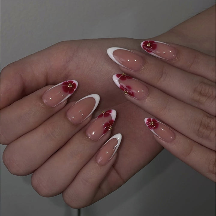 Artistic stiletto nails with luxurious floral design Stornfield