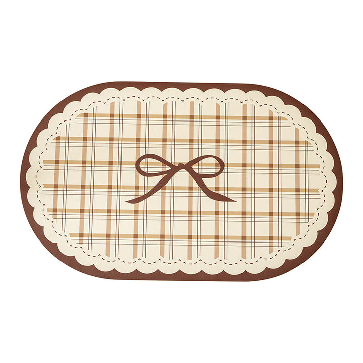 Rectangular wipeable placemat with checked pattern, wavy decorative edge and bow motif Stornfield