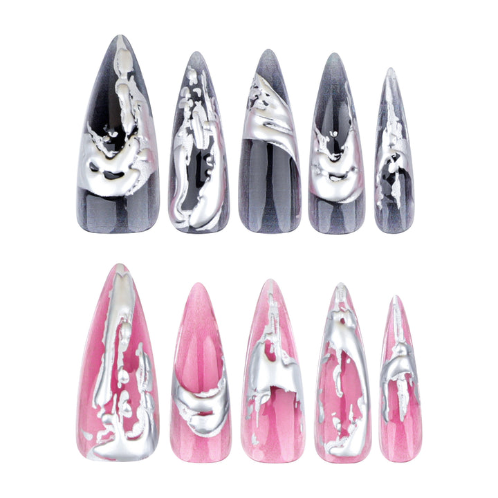 Creative stiletto nails with unique metallic details Stornfield