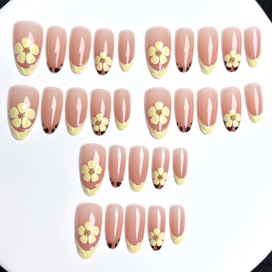 Artistic Press-On Nail Set with Floral Embellishments