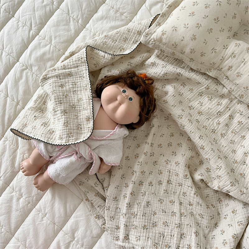 Unisex Muslin Blanket with delicate floral design and elegant ruffles Stornfield