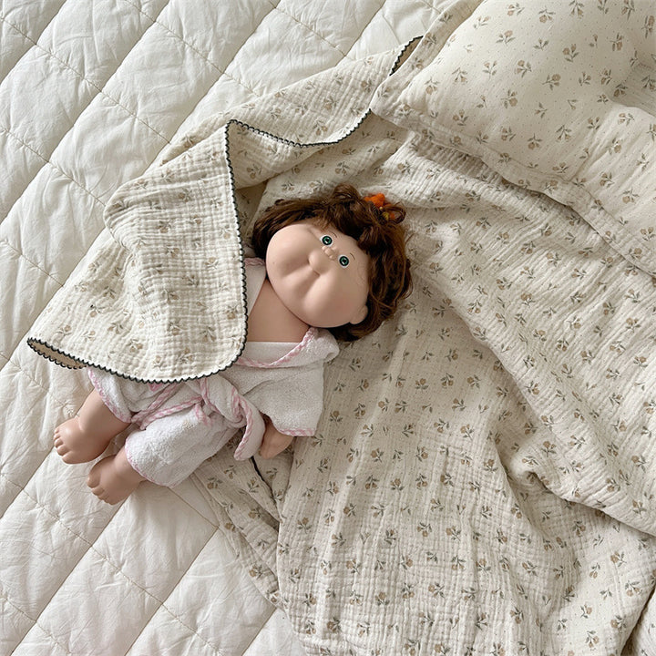 Unisex Muslin Blanket with delicate floral design and elegant ruffles Stornfield