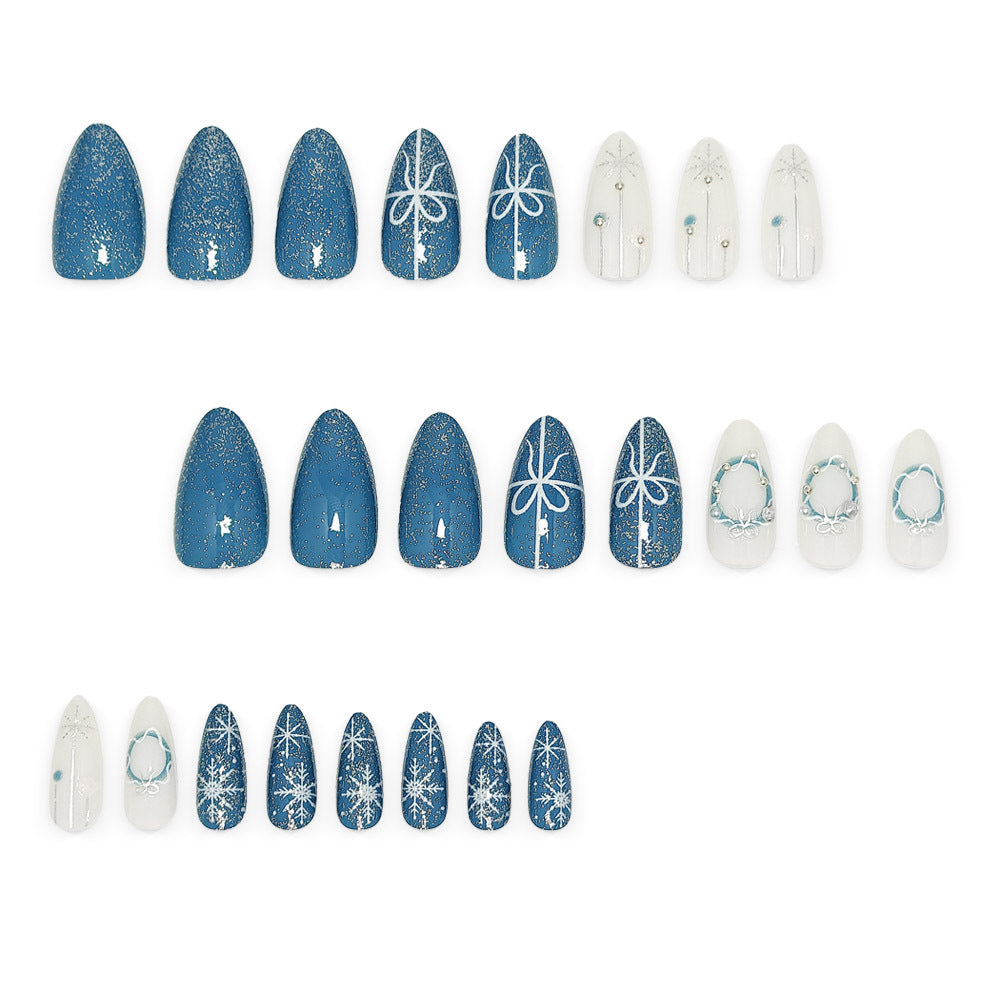 Artificial nails in elegant winter design with glitter accents Stornfield