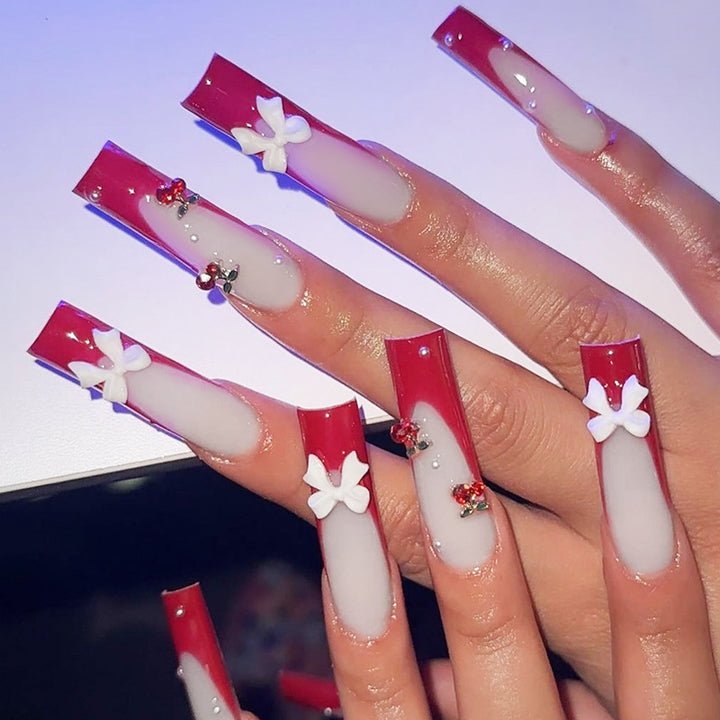 Creative nail set with festive cherry motifs Stornfield