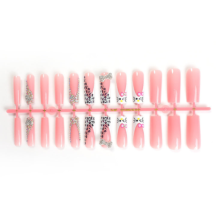 Glamorous artificial nail set with sparkling rhinestone embellishments and creative animal designs Stornfield