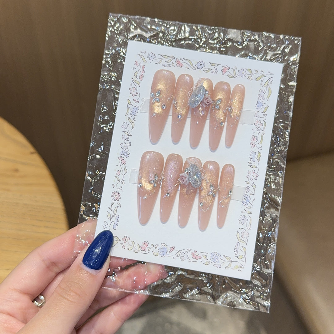Artificial nails with romantic floral and glitter details Stornfield