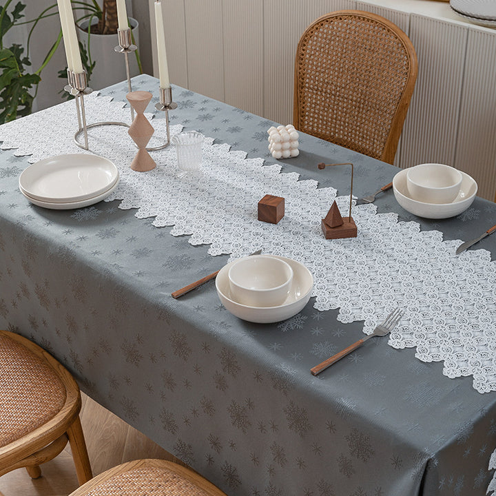 Rectangular premium table linen made of jacquard polyester with subtle frost floral embossing Stornfield