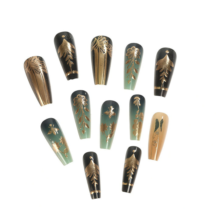Artificial nails with floral gold embellishments Stornfield