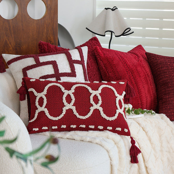 Rectangular decorative cushion with bouclé relief and tassels Stornfield