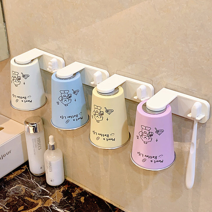 Wall-mounted toothbrush holder with playful design Stornfield