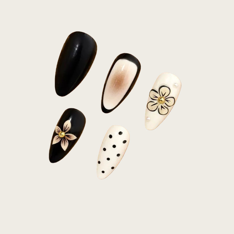 Creative artificial nails with elegant 3D flower accents Stornfield