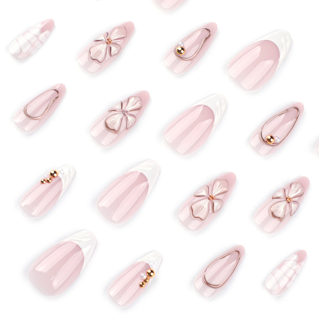 Artful stiletto nails with floral and shimmering decor Stornfield