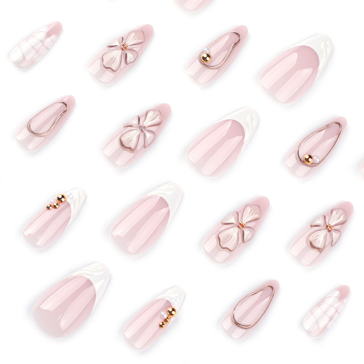 Artful stiletto nails with floral and shimmering decor Stornfield