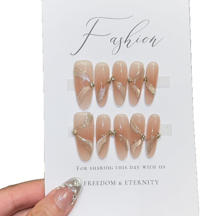 Artificial nails with elegant rhinestone accents Stornfield