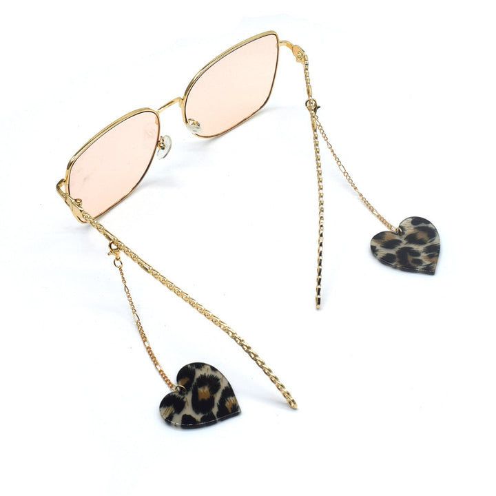 Heart-Shaped Dangle Earrings with Golden Chain Stornfield