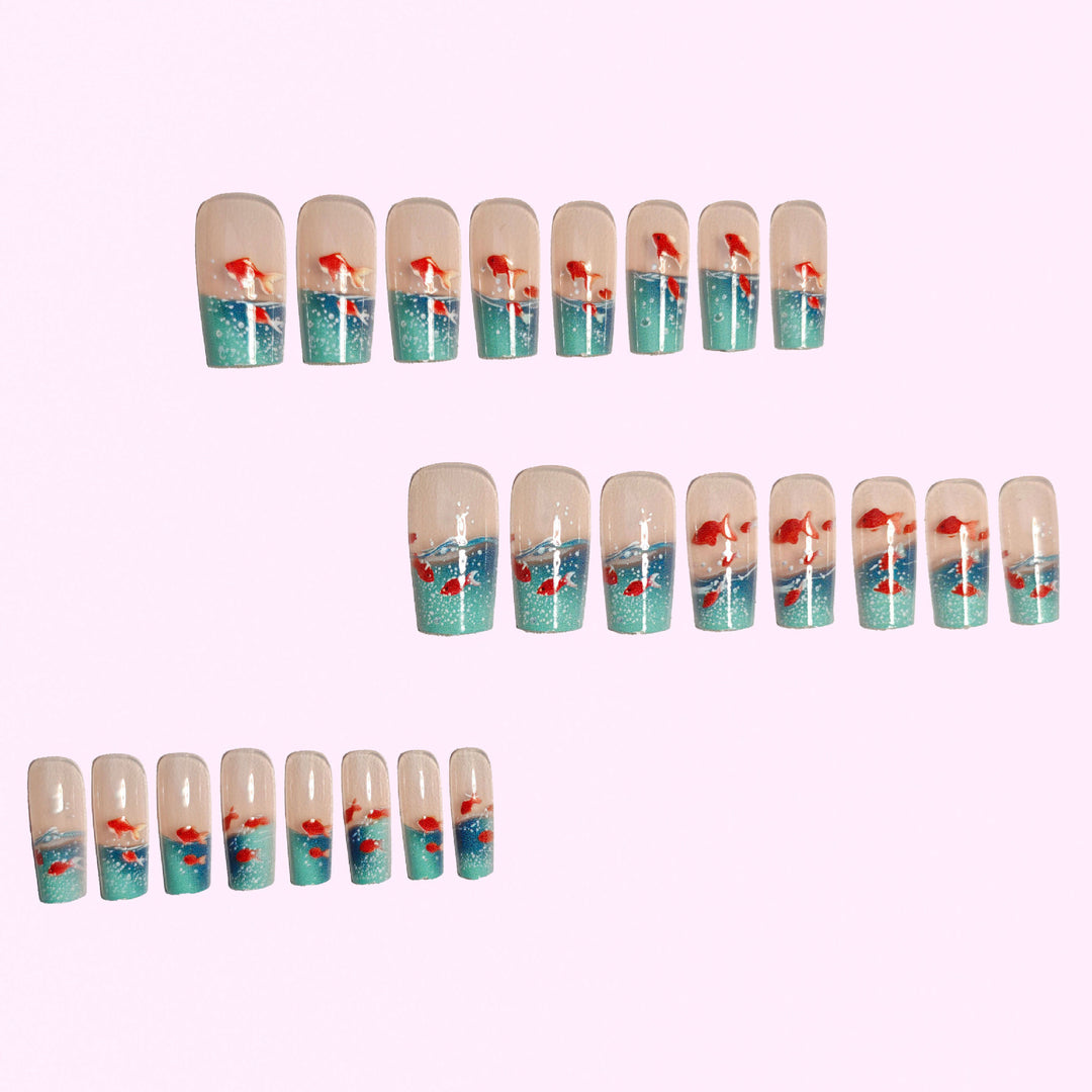 Artifical nails with maritime goldfish design Stornfield