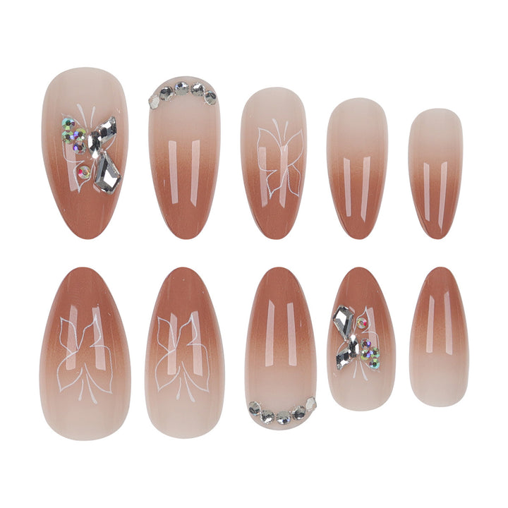 Elegant Stiletto Press-On Nails with Embellished Designs Stornfield