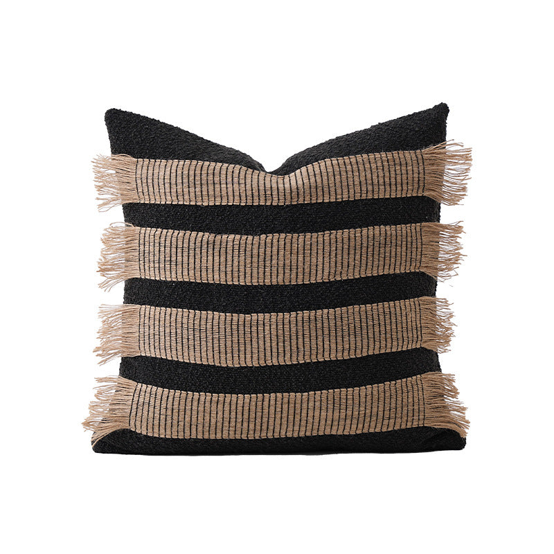 Rectangular decorative cushion with fringes and woven stripes