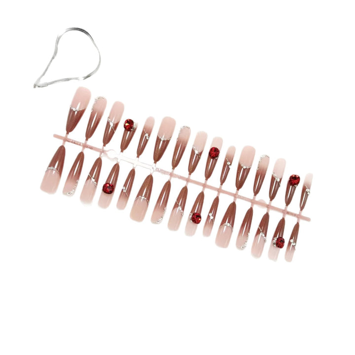 Artificial nails with luxurious 3D decorations and glamorous accents Stornfield