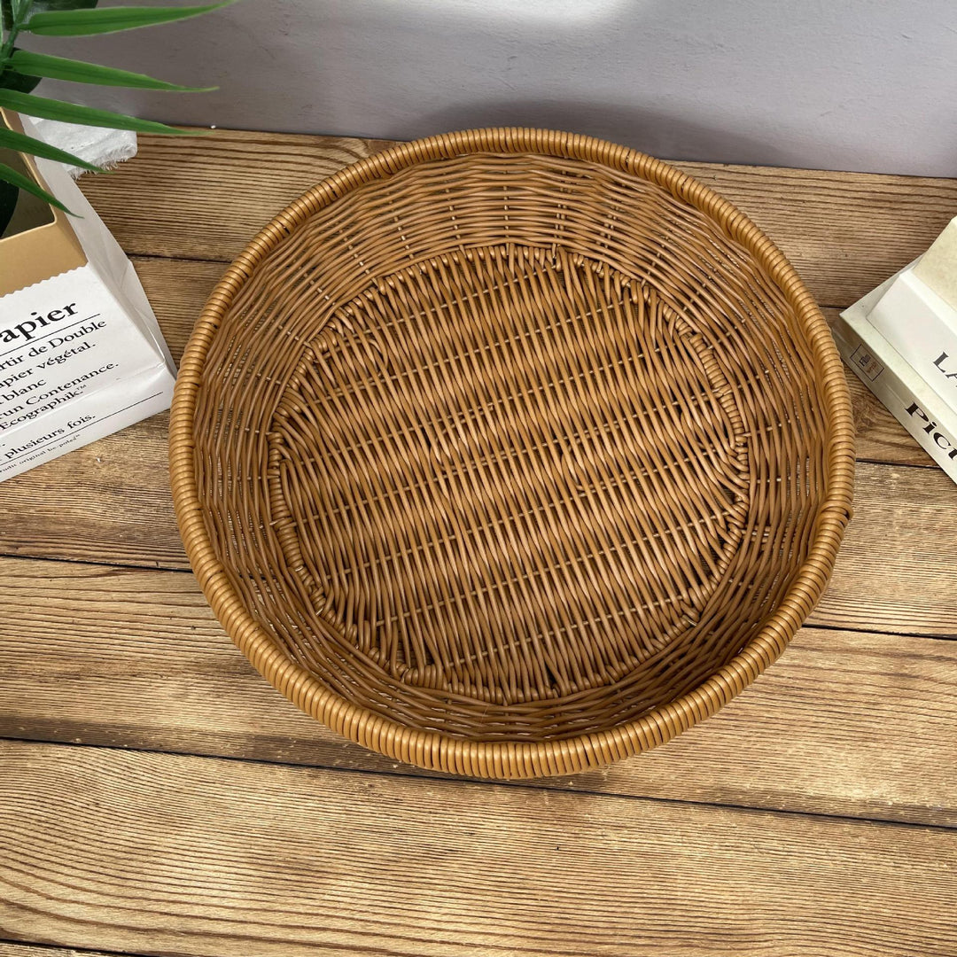 Women’s round serving basket made of woven rattan Stornfield