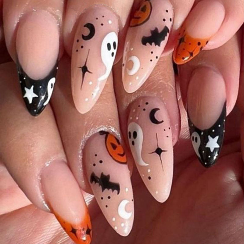 Halloween-themed artificial nails with ghost and pumpkin motifs Stornfield