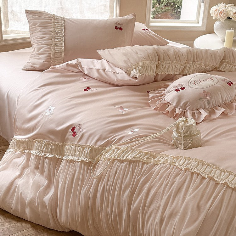 Luxurious satin bedding set with gathered ruffle, cherry embroidery and decorative pillow