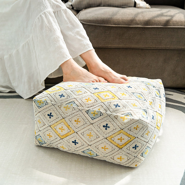 Seating pouf made of woven cotton blend with quilted diamond relief Stornfield
