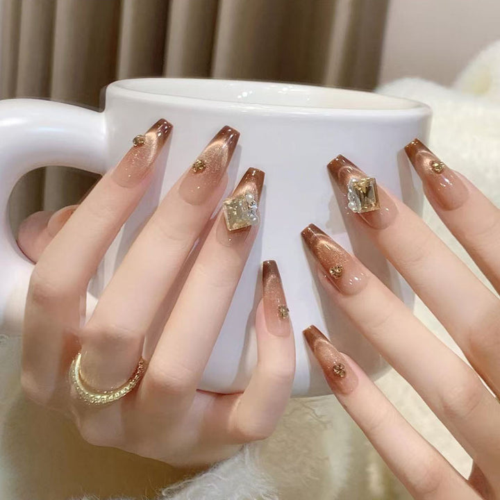 Artificial nails with elegant ombre effect and exquisite gemstones Stornfield