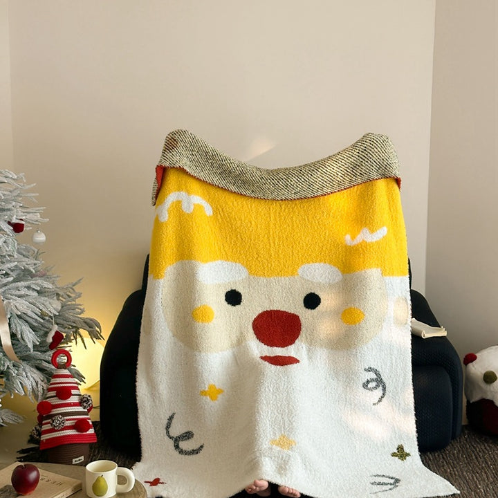 Cozy blanket in knit look with large animal face and soft terry surface