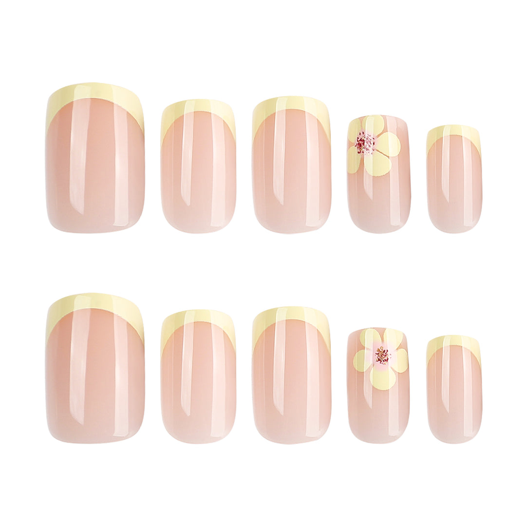 Artistic French-tip nails with floral decorations Stornfield