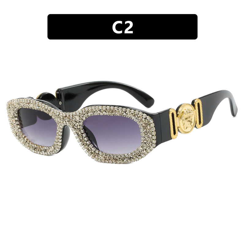 Women's extravagantly designed sunglasses with rhinestone-studded frame Stornfield