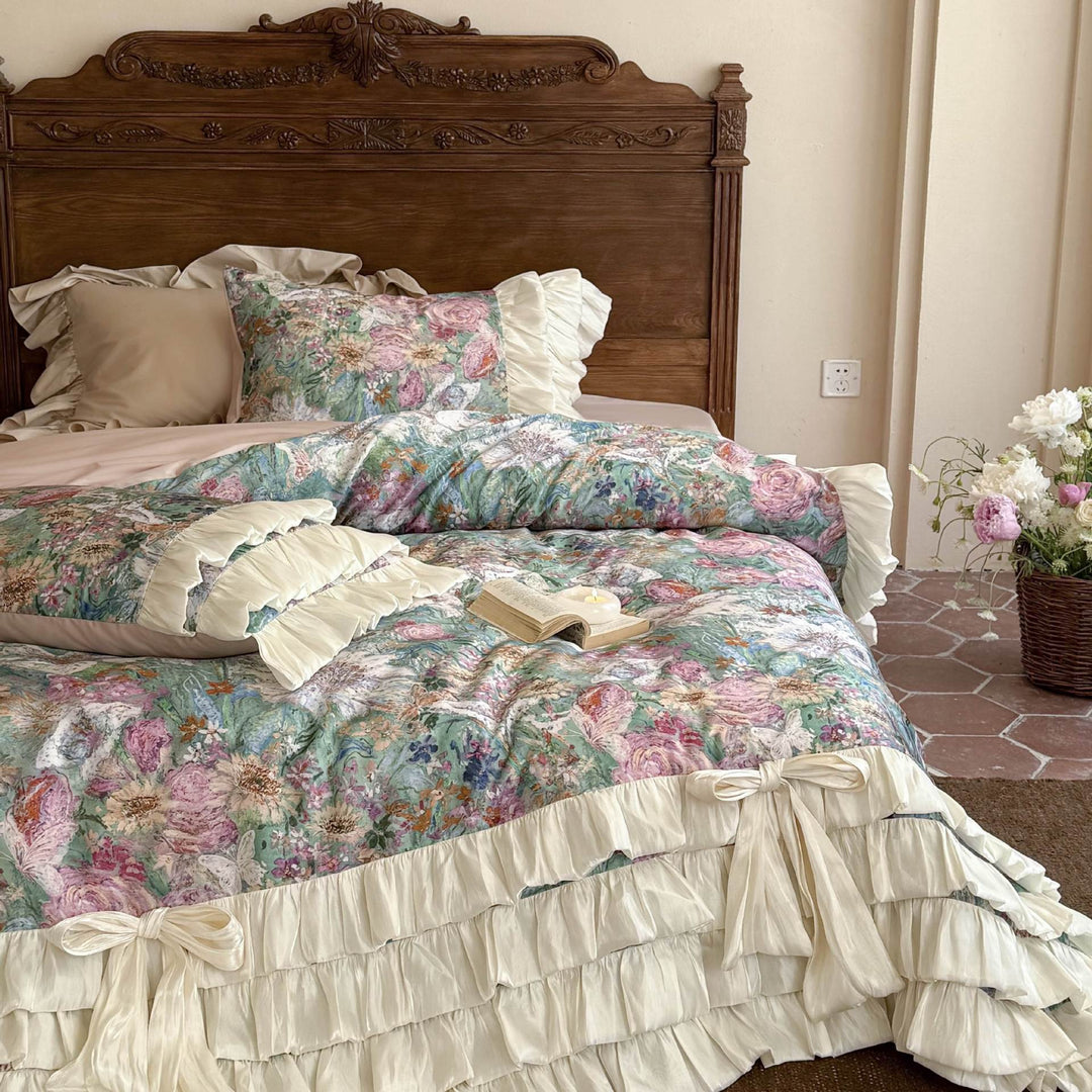 Luxurious bedding set with ruffles, bed skirt, and floral print