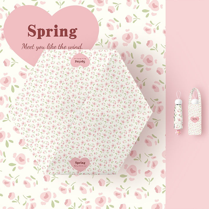 Ladies folding umbrella with playful flower design Stornfield