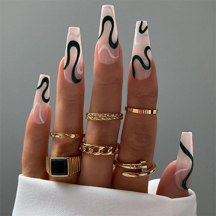 Artifical nails with luxurious wave pattern Stornfield