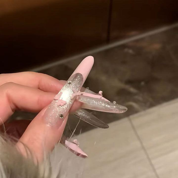 Glamorous Long Stiletto Nail Art Extensions with Rhinestone Accents