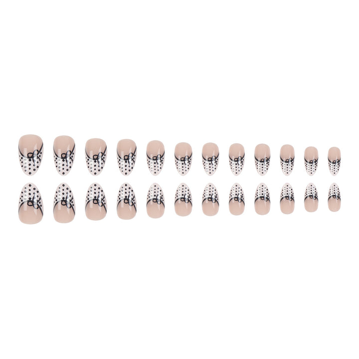 Elegant Stiletto Press-On Nails with Polka Dot Design and Bow Accents Stornfield