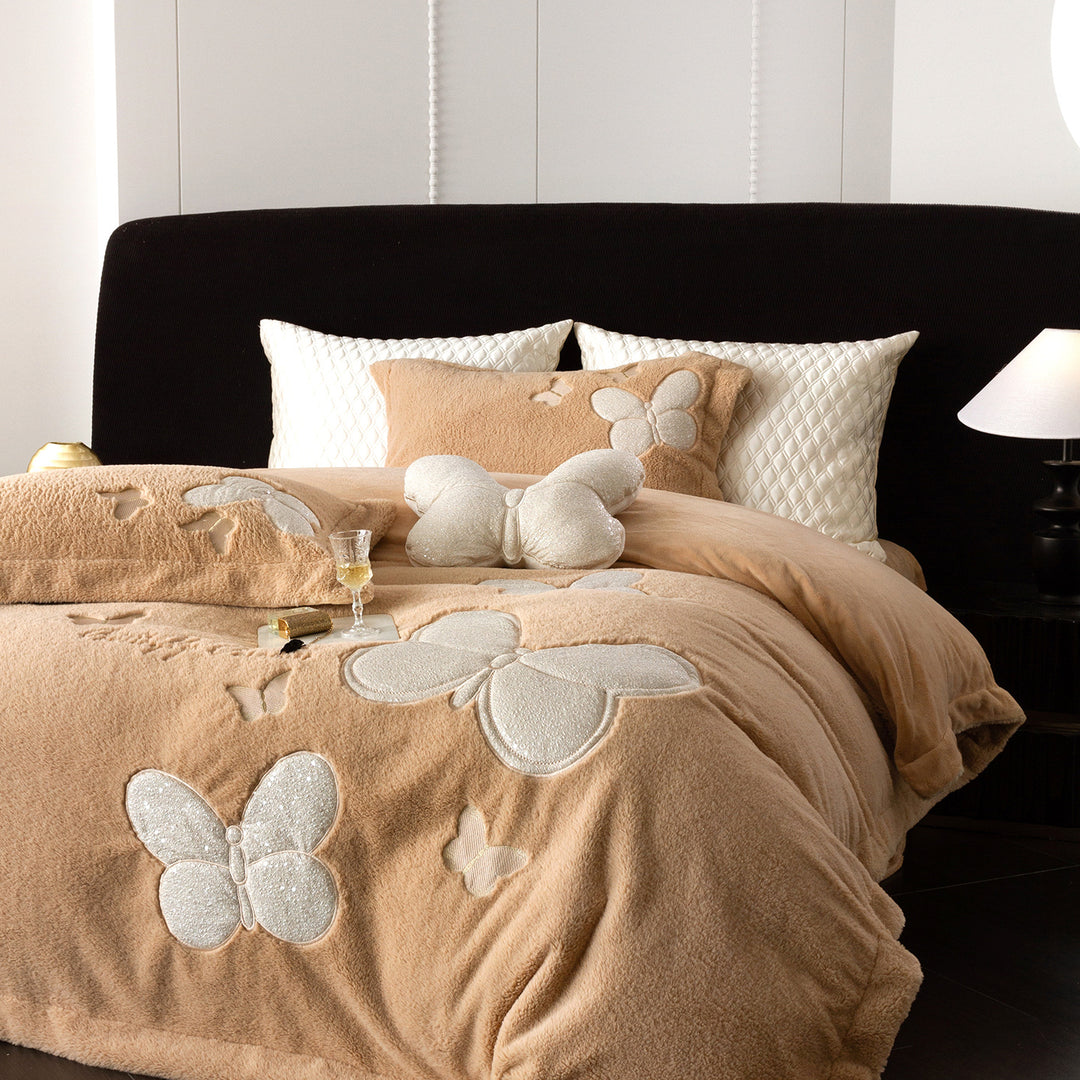 Cozy bedding and throw blanket set with applied butterfly appliqués and velvety microfleece look