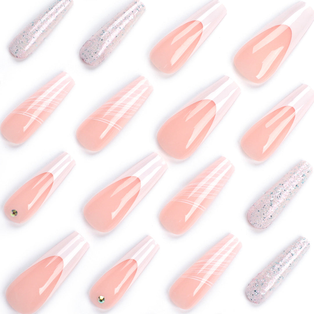 Artificial nail extensions with elegant glitter design Stornfield