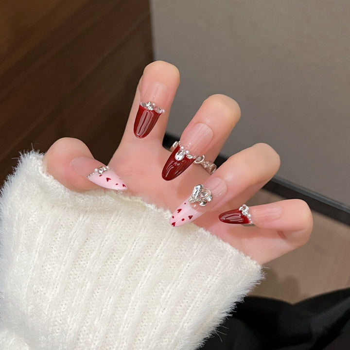 Elegant Nail Art Extensions with Pearl Accents Stornfield