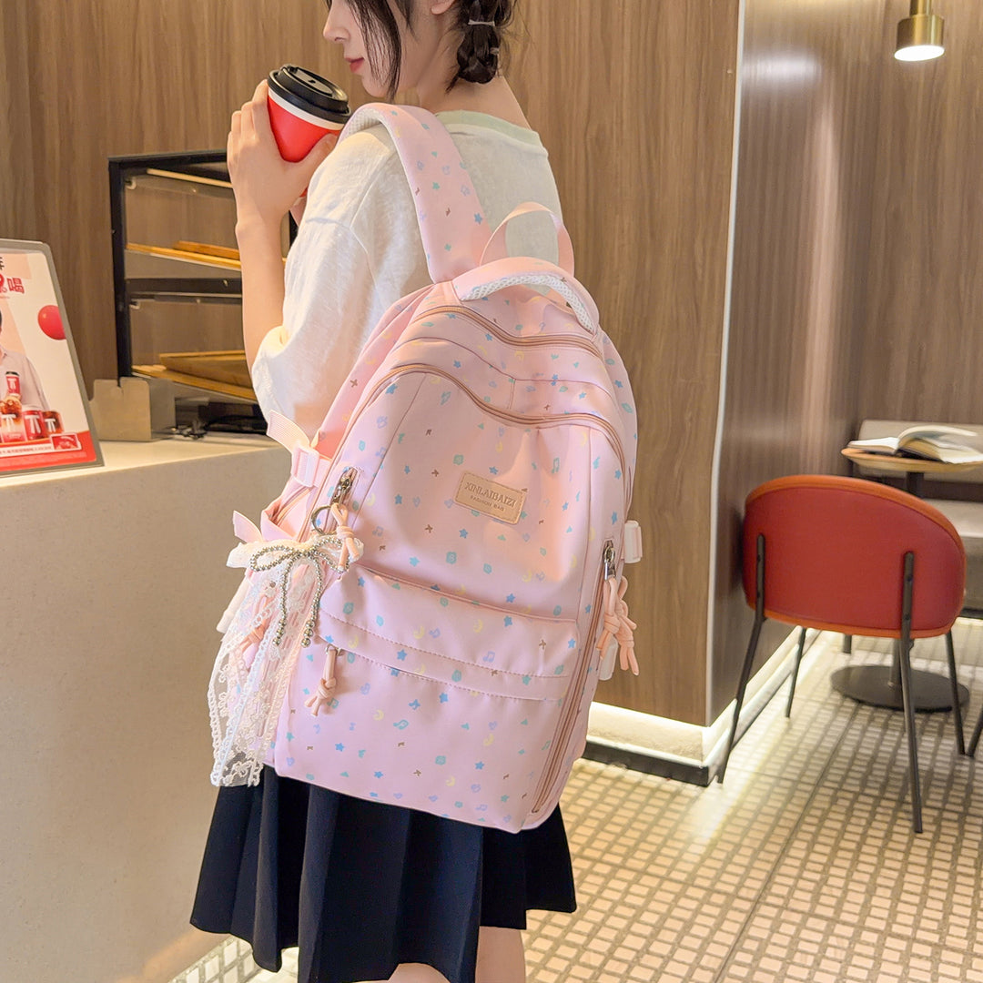 Stylish Multi-Pocket Backpack with Decorative Accents Stornfield