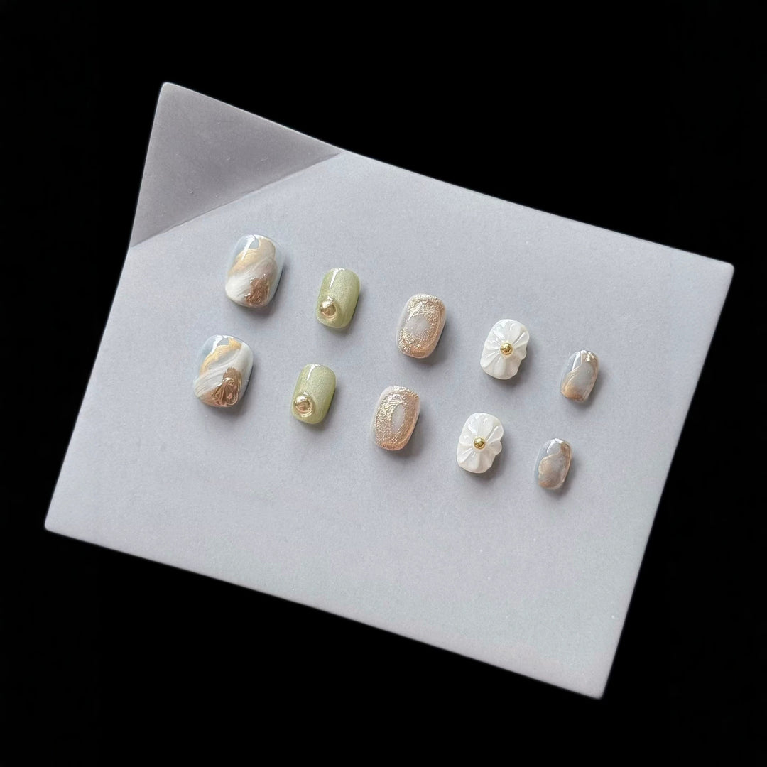 Premium Press-On Nail Art Set with Floral and Metallic Accents